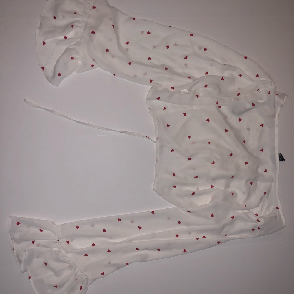 flowy white crop top with red hearts